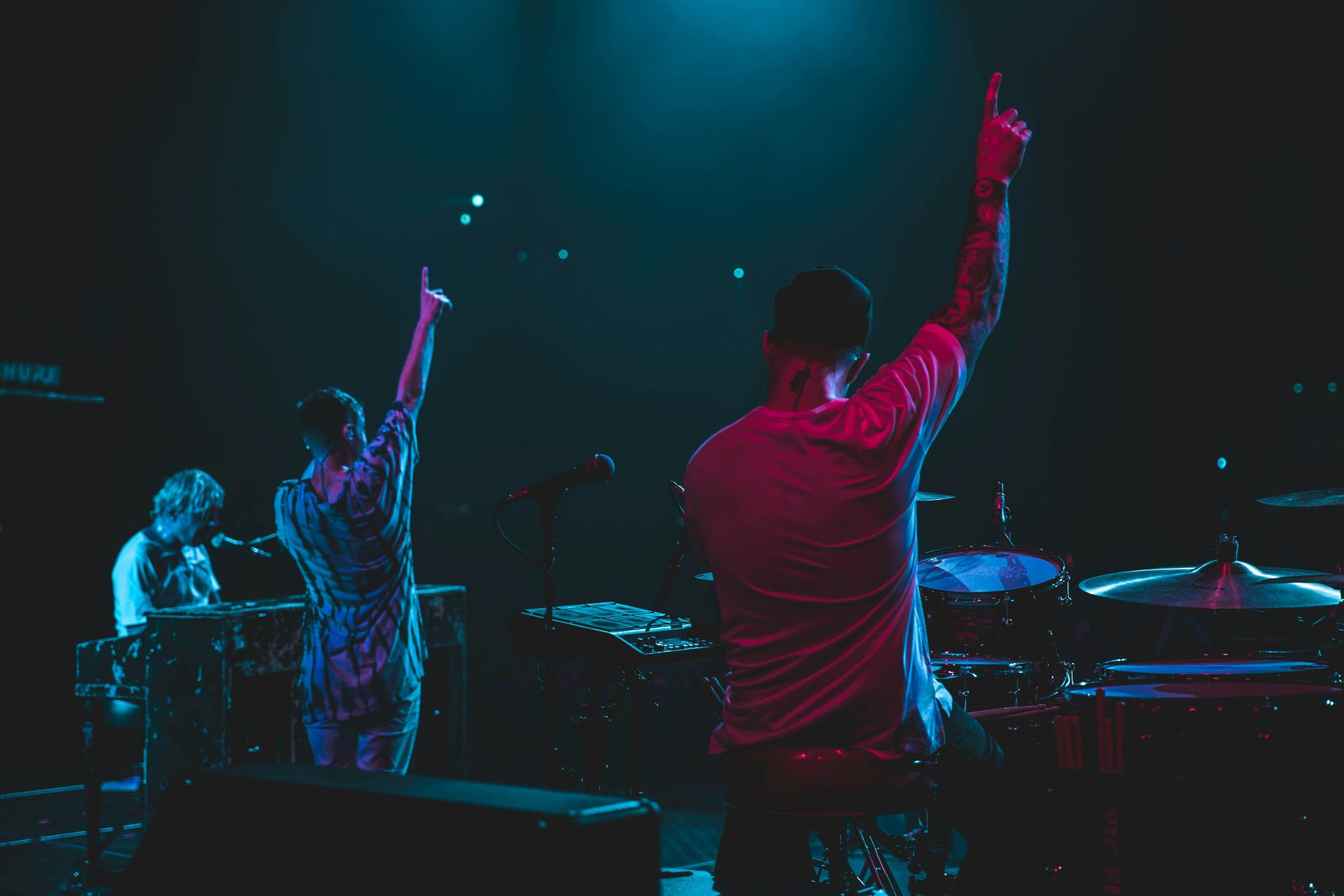 two person raising hands